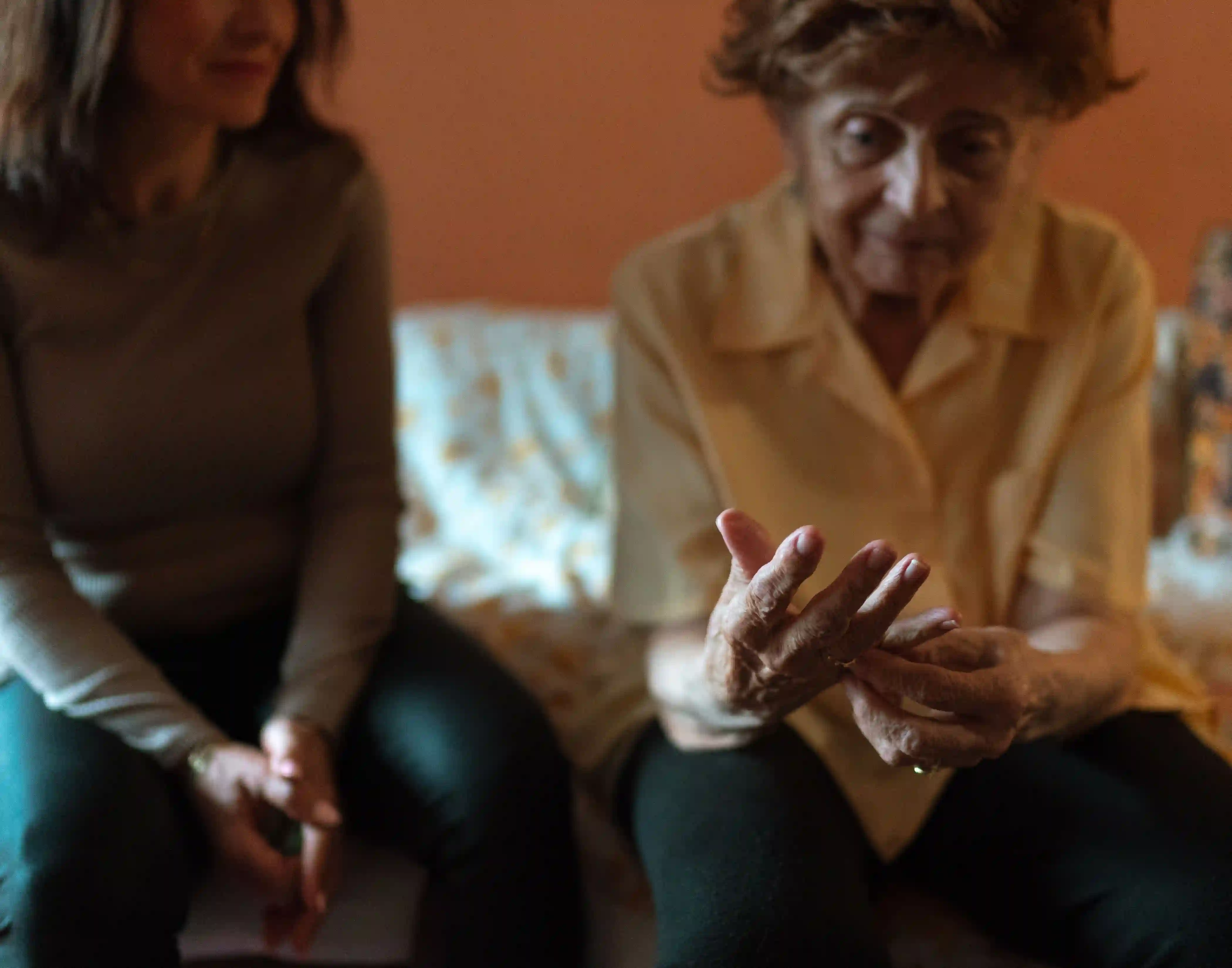 Caregiver reviewing a senior care supply list